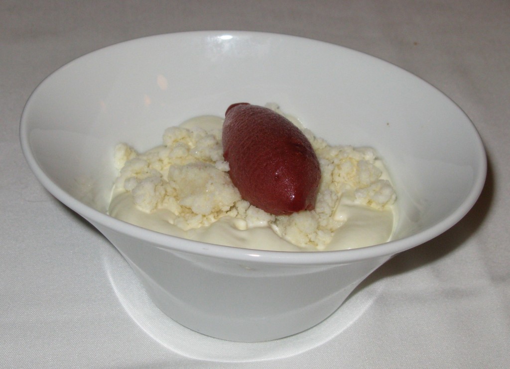 Dessert of "cherries, almond sponge cake, camomille cream, almond granité. and cherry sorbet"