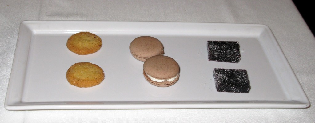 Mignardises, from left to right: sablés, macarons, and pâtes de fruits aux mûres