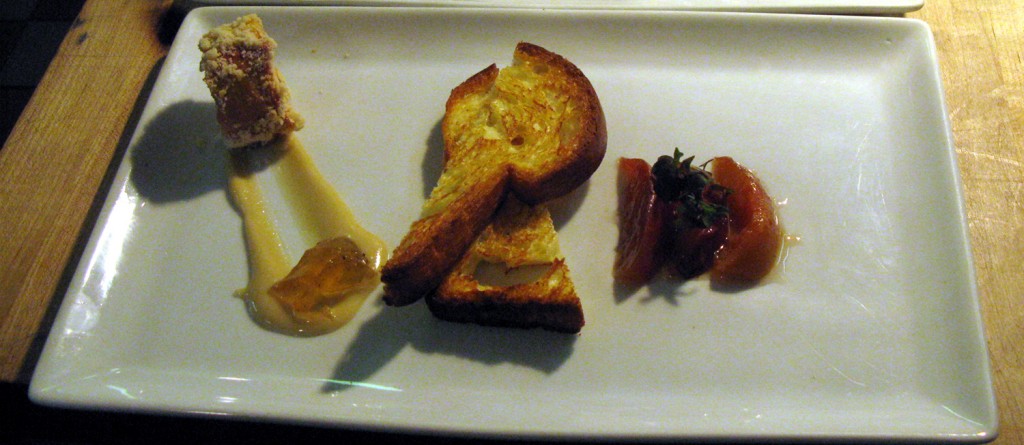 Foie gras torchon, roasted almond purée, honey jelly, brioche, and roasted peaches