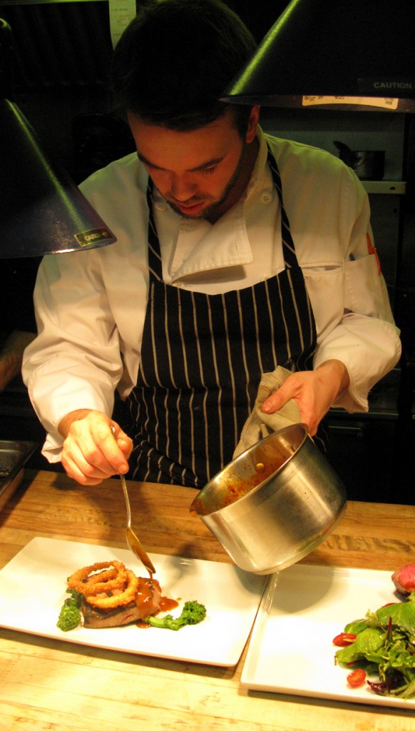 Chef Seth Gabrielse at work in the kitchen of Laloux